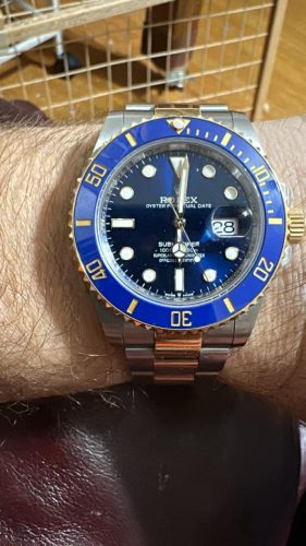 rolex submariner on wrist 1